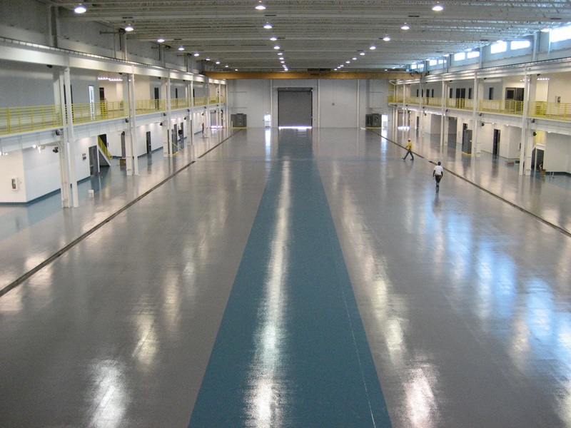 This image shows a factory with an epoxy floor.