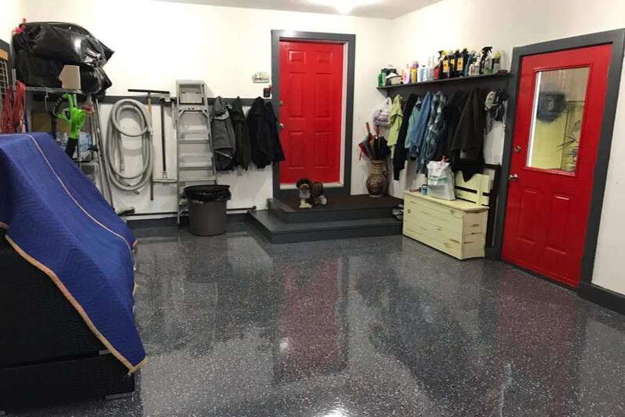 This image shows a garage with a shiny epoxy floor.