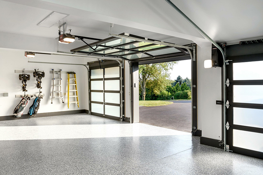 This image shows a garage floor with flake epoxy flooring.